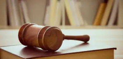 Суд взыскал со столичного ОСИ долги для ТОО