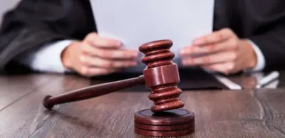 Двоих сотрудников Антикора осудили за взятки